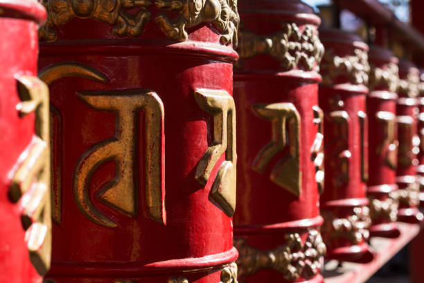 istock Buddhist prayer drum of red color. 667182002