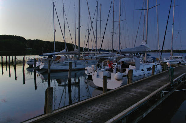 istock Harbour with pier and sailing yachts in the blue hour 667184066