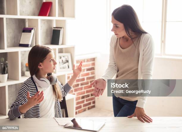 Mom And Troubled Daughter Stock Photo - Download Image Now - Parent, Teenager, Mother