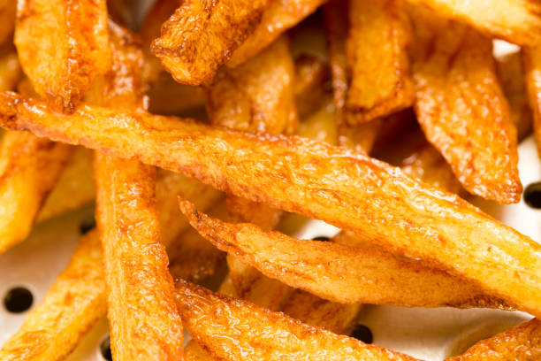 istock french fries background, closeup shot 667195072
