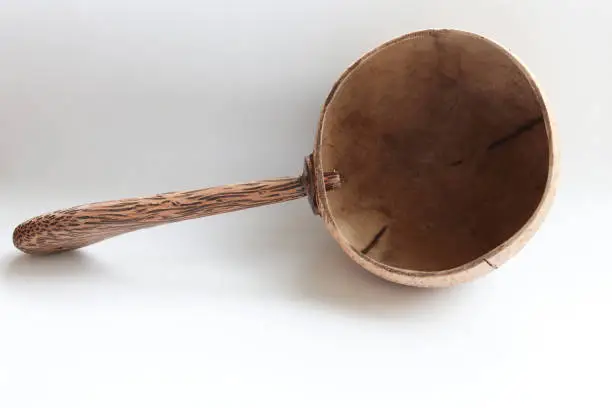 Coconutshell ladle handmade on  white background