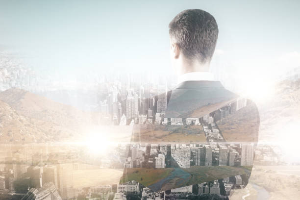 istock businessman on city background 667200126
