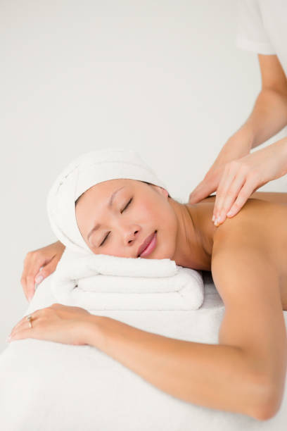 istock Attractive woman receiving back massage 667202978