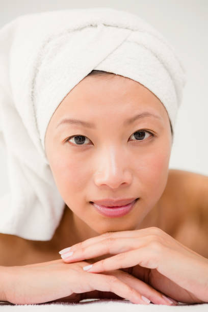 istock Attractive woman lying on the massage table 667203000