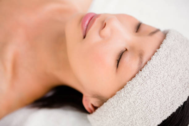 istock Relaxed woman lying on the massage table 667205926