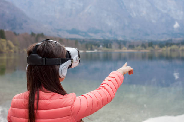 istock young woman in VR glasses 667206146