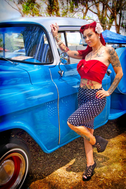 Another Era Model with a 1950's era pickup truck in San Diego, California. pin up girls and cars stock pictures, royalty-free photos & images