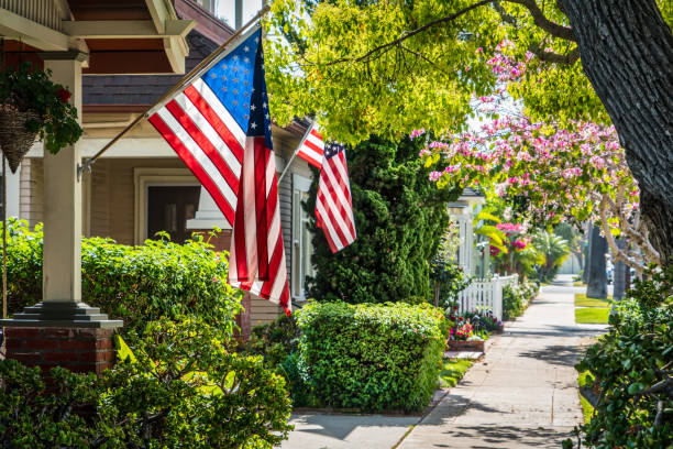 Flags 1 Flags on a southern California street. small town america stock pictures, royalty-free photos & images
