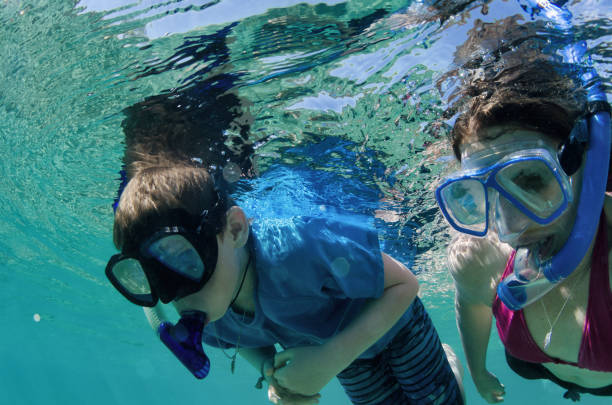 istock Snorkeling with mom 667224798