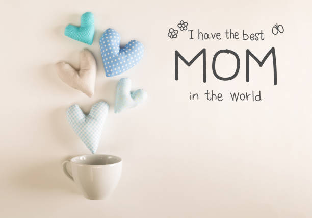 istock Mother's Day message with blue heart cushions 667230022
