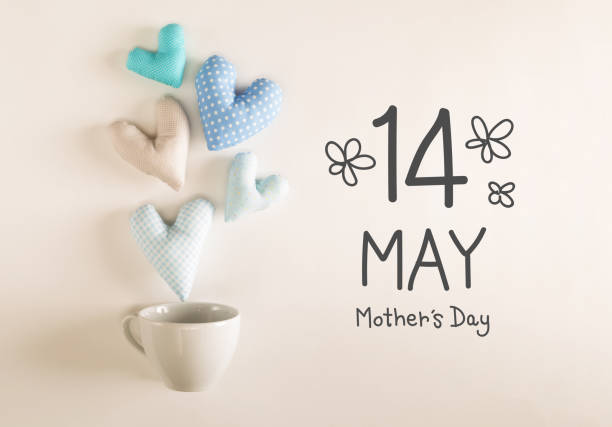 istock Mother's Day message with blue heart cushions 667230026