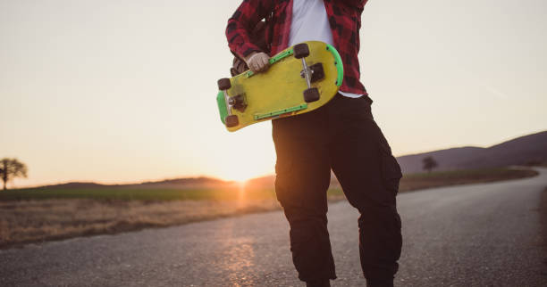 istock Skater with yellow skateboard 667233198