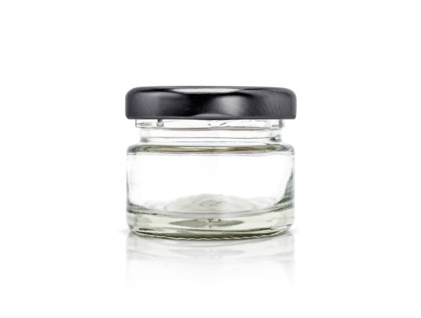 istock blank packaging clear glass bottle with black aluminum cap isolated on white background 667234068