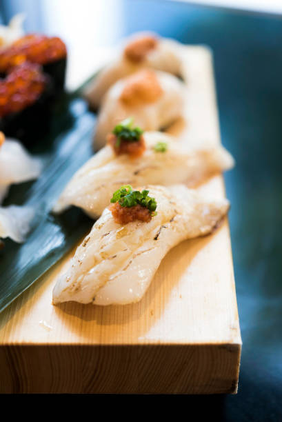 istock Engawa aburi sushi on wooden plate 667237406