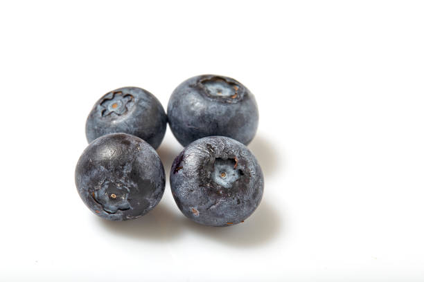 istock Fresh blueberry isolated on white 667237560