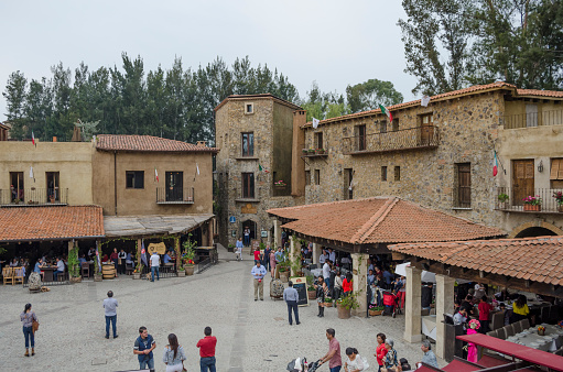 VAL'QUIRICO, TLAXCALA,MEXICO- MARCH 25, 2017: Medieval square with restaurants in Val'Quirico, a new town near to Tlaxcala, Mexico