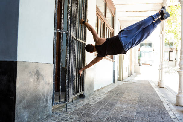 istock Man doing parkour in the city 667245130