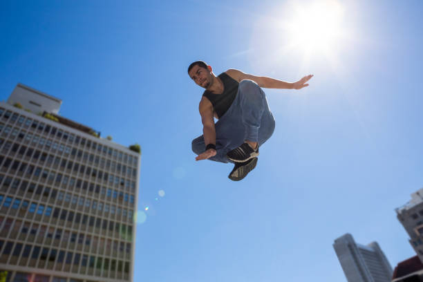 istock Man doing parkour in the city 667247866