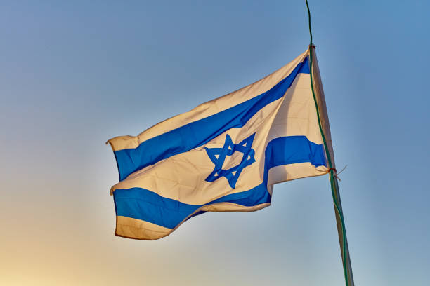 istock Israel flag at sunset 667255946