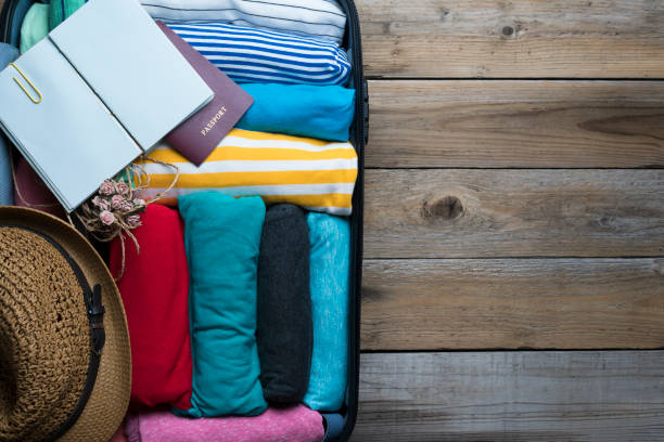 istock packing a luggage for a new journey 667259412