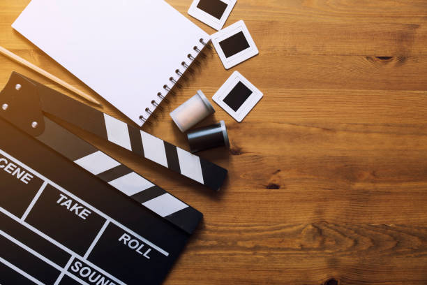 istock movie clapper on wood table 667259650