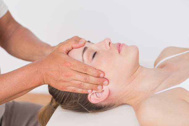 istock Woman receiving neck massage 667263206