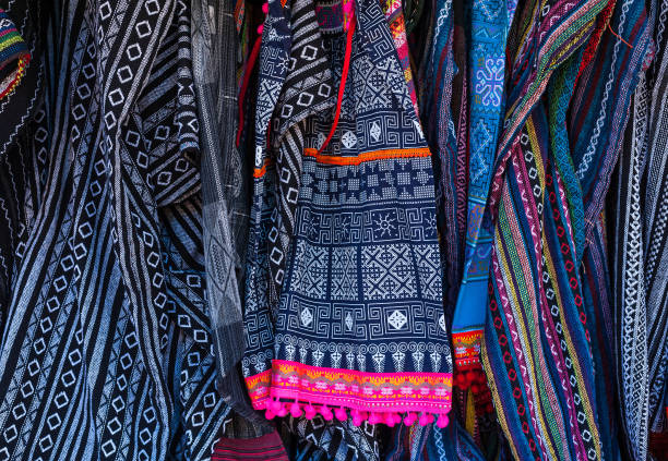 Cloth with Hmong ethnic patterns. Hmong are an ethnic group from the mountain regions of China, Vietnam, and Thailand. handmade Thai traditional Hmong fabric, Thai Thai traditional ethical pattern Cloth with Hmong ethnic patterns. Hmong are an ethnic group from the mountain regions of China, Vietnam, and Thailand. handmade Thai traditional Hmong fabric, Thai Thai traditional ethical pattern miao minority stock pictures, royalty-free photos & images