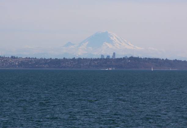 istock Distant View Of Mt. Rainier Across Puget Sound 667272628