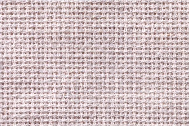 istock White textile background closeup. Structure of the fabric macro 667281398