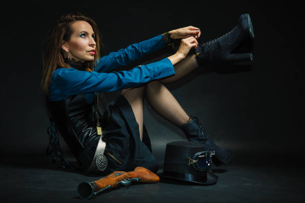 istock Vintage girl fixing footwear. 667291704