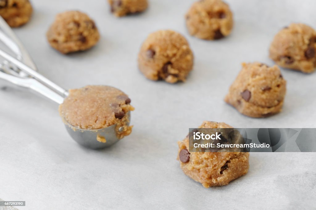 chocolate chip cookie dough with ice cream scoop Australia Stock Photo