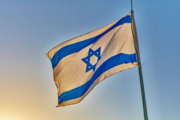 istock Israel flag at sunset 667296166