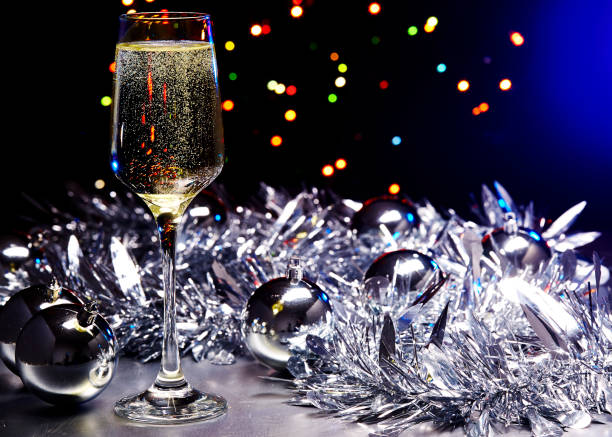 New Year's still-life with champagne and a lighting