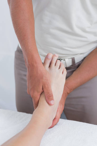 istock Woman having foot massage 667301414