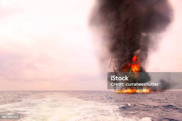 Offshore Oil And Rig Construction Damaged Because Worst Case Or Fire Case Which Cant Control Situation Oil Spill Into The Sea Because Incorrect Of Operation And Accident In Job Out Of Safety Rule Stock Photo - Download Image Now