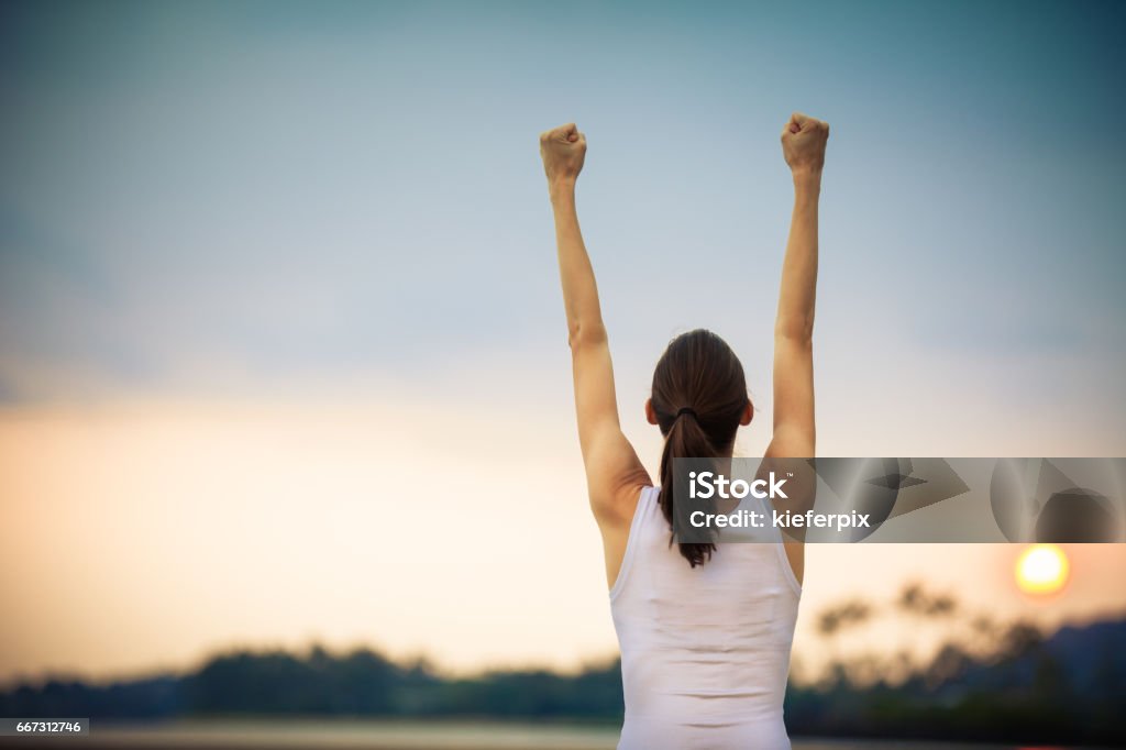 Winner Woman celebrating her goals. Winning concept. Women Stock Photo