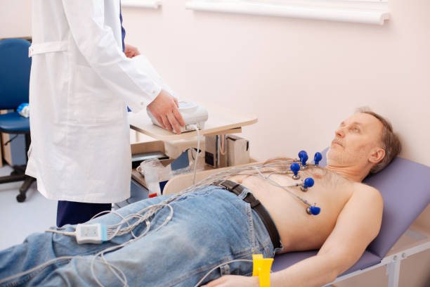 istock Enduring tired pensioner being examined 667316214