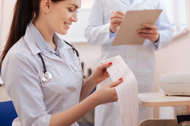 istock Delighted professional cardiologist telling about positive tendencies 667319418