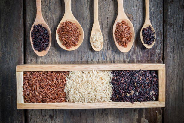 istock Rice seed,brown rice, keep healthy concept, brown background 667324210