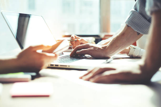 Group of young business people working together stock photo