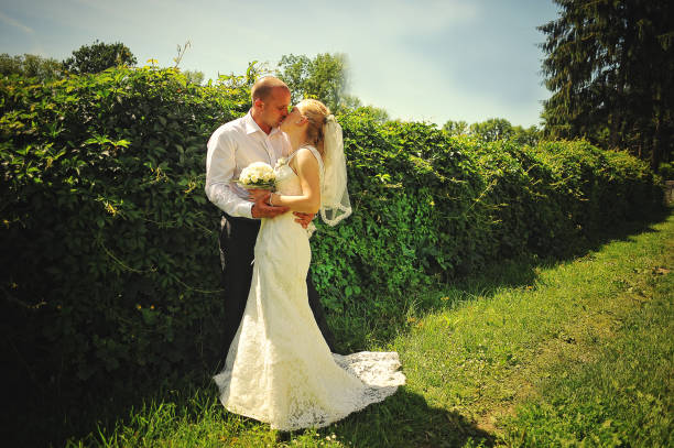 istock Just married couple walking in love 667335686
