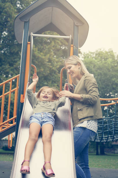 istock Mother in the park with her baby. 667336264