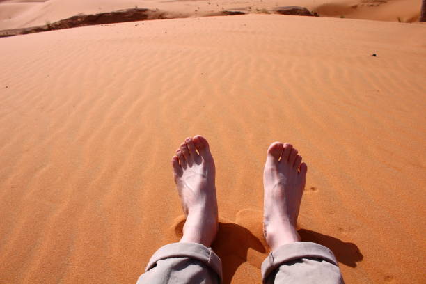 istock a man resting on the desert in sahara of morocco 667336594