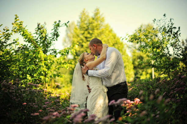 istock Just married couple walking in love 667336748