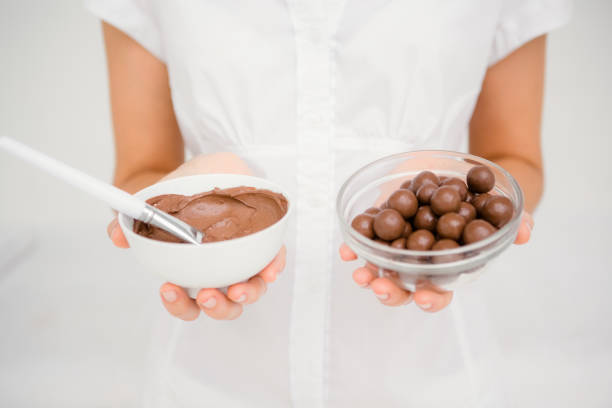 istock Woman having chocolate to do a masage 667336810