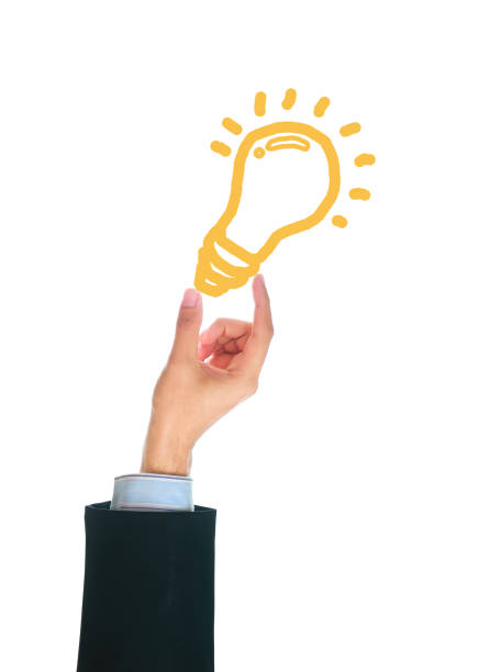 istock male hand holding writing lamp 667339484