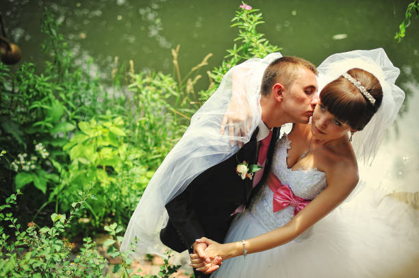istock wedding couple in love at their happy day 667340896