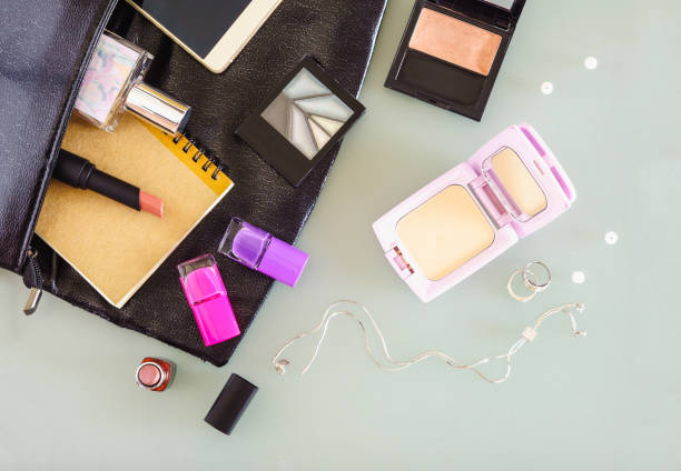 istock Top view of woman's bag, cosmetic, makeup set 667346238