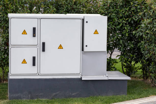 istock Outdoor plastic electrical cabinet with warning signs 667349860