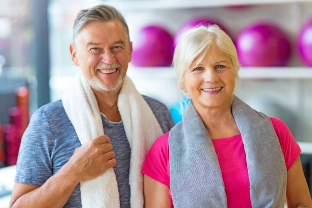 istock Mature couple doing fitness exercises 667356616
